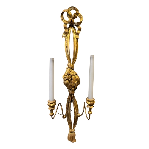 77 - BritishCirca 1960A group of three carved giltwood wall lightsProvenance: Ossowski, LondonTo be sold ... 