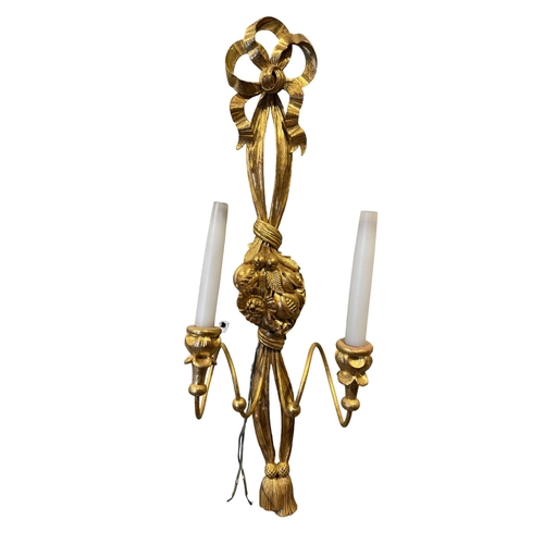 77 - BritishCirca 1960A group of three carved giltwood wall lightsProvenance: Ossowski, LondonTo be sold ... 