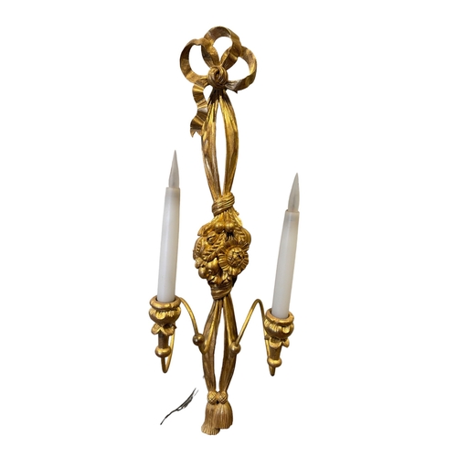 77 - BritishCirca 1960A group of three carved giltwood wall lightsProvenance: Ossowski, LondonTo be sold ... 