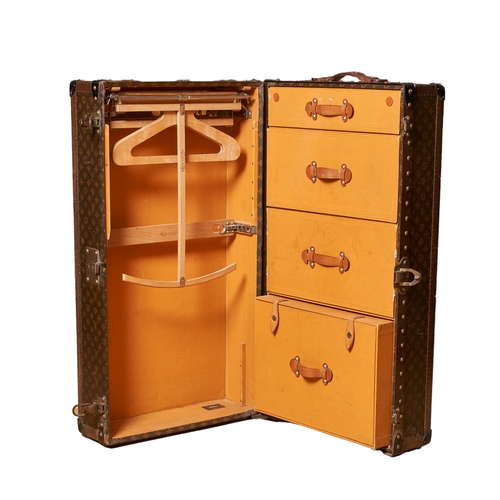 82 - Louis VuittonEarly 20th CenturyA monogram canvas 'Malle Armoire' wardrobe trunkBrass studded wooden ... 