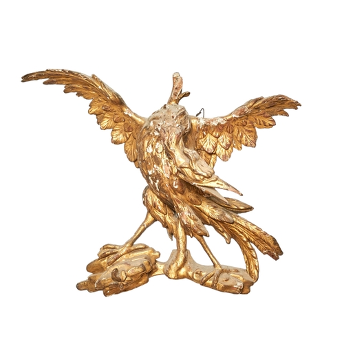 9 - British18th/19th CenturyA pair of carved giltwood ho ho bird architectural elementsProvenance: Ossow... 