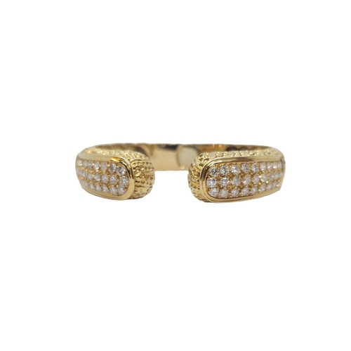 95 - Circa 1970A diamond and 18 carat gold bangle set to the front with 54 brilliant cut diamondsWeight: ... 