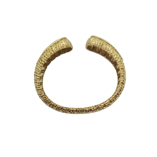 95 - Circa 1970A diamond and 18 carat gold bangle set to the front with 54 brilliant cut diamondsWeight: ... 