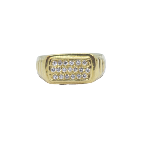 98 - ItalianCirca 1980An 18 carat gold and diamond dress ringThe rectangular top pave is set with brillia... 