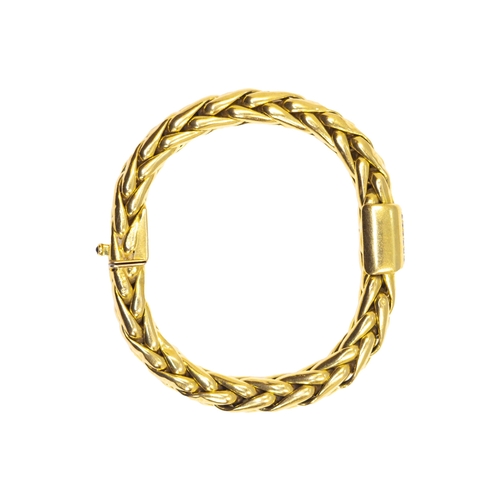 103 - Caplain ParisCirca 1980A diamond and 18 carat yellow gold braceletThe chevron design with pavé... 