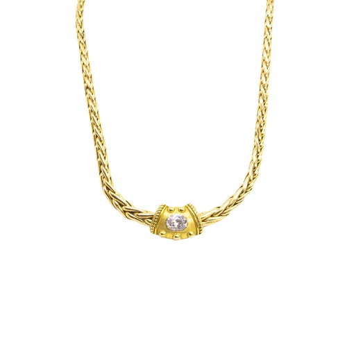 105 - Caplain ParisCirca 1980A 18 carat yellow gold and cubic zirconia necklaceThe tapered chevron design ... 