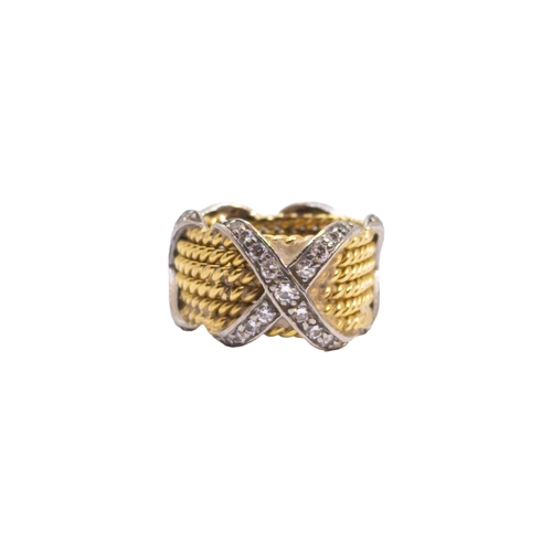 108 - Tiffany and Co.Circa 1980A Schlumberger diamond and 18 carat yellow gold band ringWeight: Approx. 9.... 