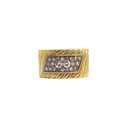 110 - BritishCirca 1970A diamond and 18 carat yellow gold band ringThe pavé set brilliant cut diamonds set... 