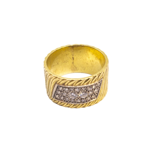 110 - BritishCirca 1970A diamond and 18 carat yellow gold band ringThe pavé set brilliant cut diamonds set... 