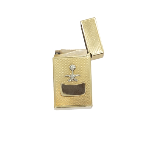 113 - S. Dupont for MouawadAn 18 carat gold lighterThe gold lighter case engine turnedWith a Saudi Arabian... 