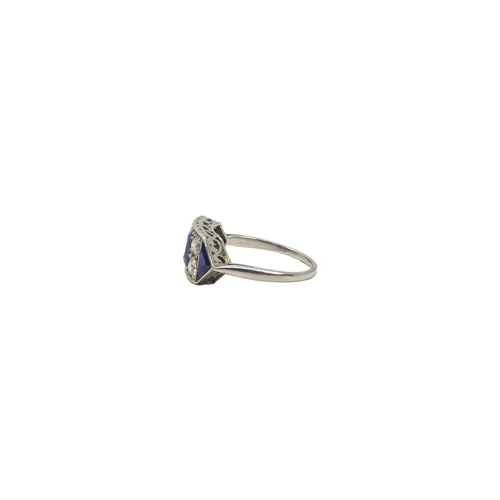 119 - BritishCirca 1920A fine sapphire and diamond ringThe oval shaped central sapphire weighing approxima... 