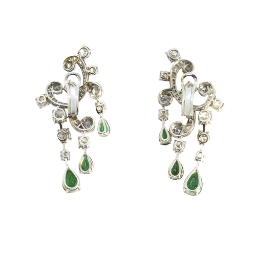 125 - EuropeanCirca 1980A fine and attractive pair of diamond and emerald earringsThe tops composed of bri... 