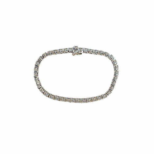 129 - BritishCirca 1990A fine brilliant cut diamond line braceletComposed of 40 fine quality brilliant cut... 