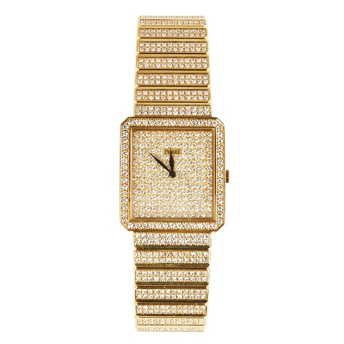 131 - Piaget, Circa 1990A unisex 18 carat gold diamond set wrist watchThe dial pave is set with brilliant ... 