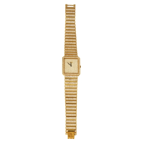 131 - Piaget, Circa 1990A unisex 18 carat gold diamond set wrist watchThe dial pave is set with brilliant ... 