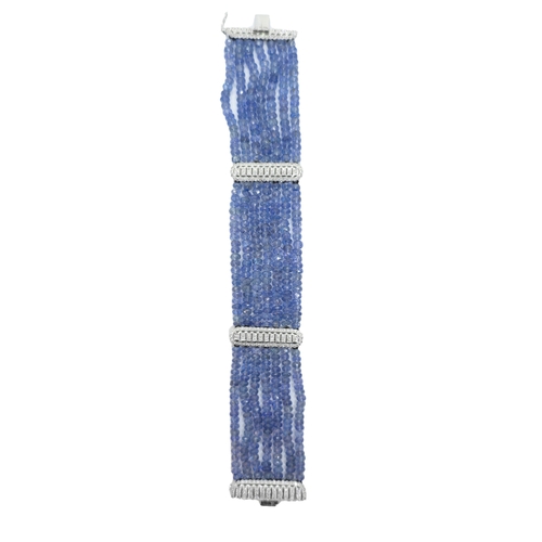 133 - ContinentalCirca 1990An attractive sapphire bead and diamond braceletThe bracelet composed of 7 rows... 