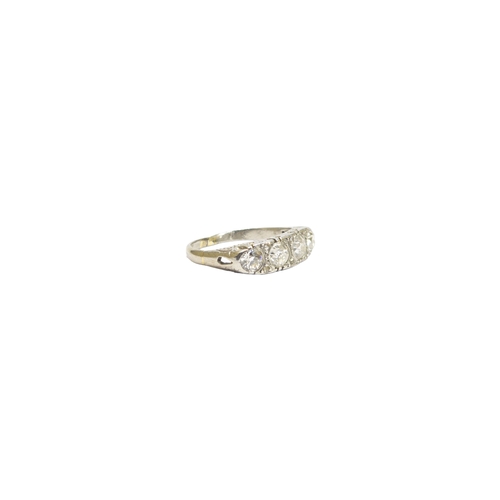 137 - BritishLate 19th CenturyA four stone diamond and platinum half hoop ring, the diamonds weighing appr... 