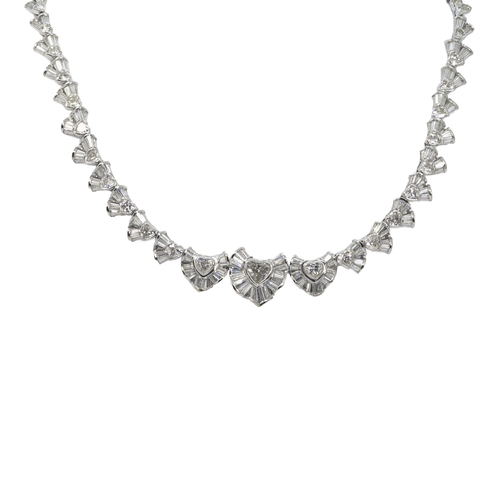 142 - BritishCirca 2000An attractive diamond necklaceComposed of heart-shaped diamond and calibré baguette... 