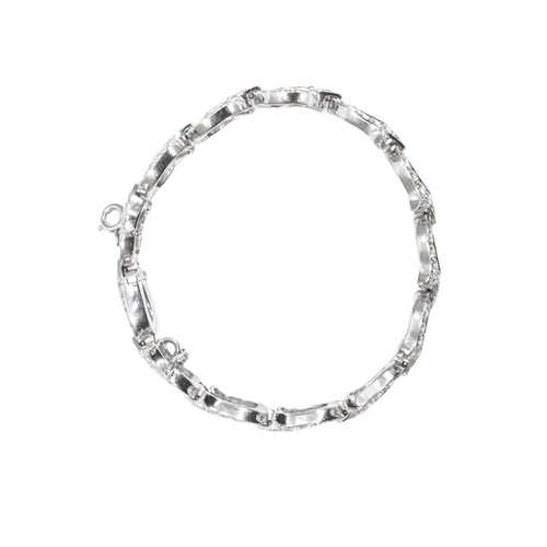 143 - Cartier, ParisCirca 1990A fine diamond and 18 carat white gold 'fuchsia' braceletThe bracelet compos... 