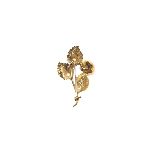 149 - EuropeanCirca 1960A yellow gold and angel skin carved colour rose broochWeight: Approx. 5.4 gramsDim... 