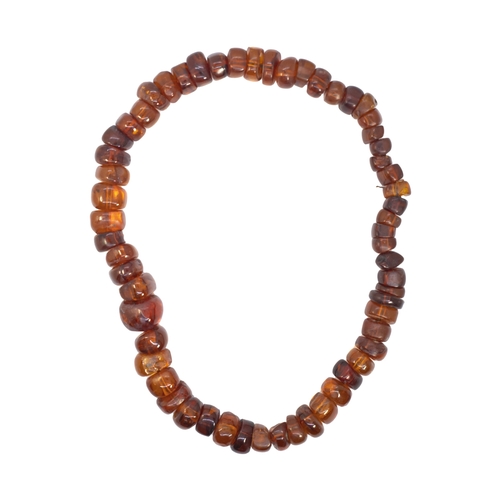 158 - EuropeanCirca 1950An irregular shaped graduated amber bead necklaceWeight: Approx. 161 gramsDimensio... 