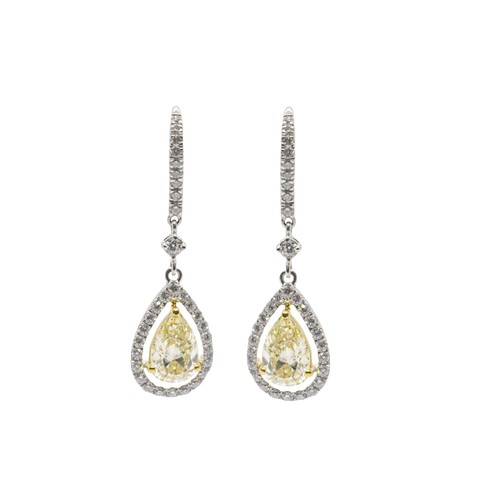 141 - BritishContemporaryA fine pair of yellow diamond and diamond drop earringsThe main pear-shaped diamo... 