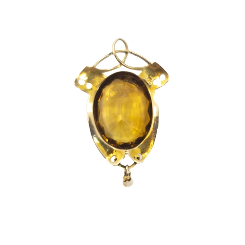 162 - BritishArt NouveauA citrine and yellow gold pendantThe setting with a small natural pearl drop, in t... 