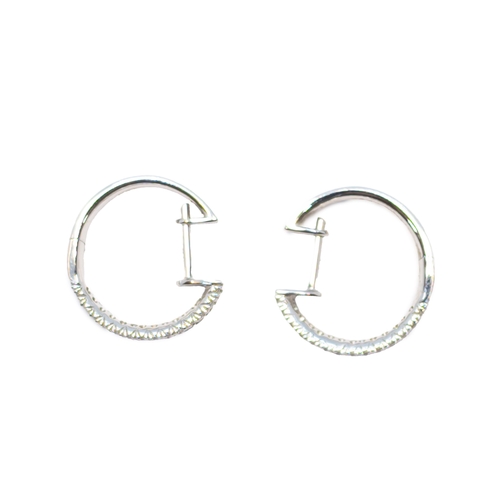 167 - BritishContemporaryA pair of pavé set diamond and 18 carat white gold hoop earringsWeight: Ap... 