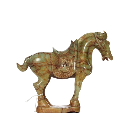 350 - Tang Dynasty styleA carved jade horseDimensions:7 in. (H) x 2.5 in. (W) x 8 in. (D)... 