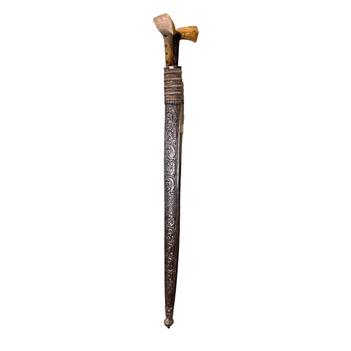 354 - 19th CenturyOttomanA presentation yataganWith bone handle and almandine garnetsDimensions:30 in. (L)... 