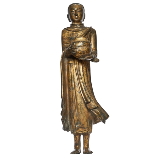 358 - Chinese/Nepalese18th-19th CenturyA gilt bronze figure of a monkDimensions:20 in. (H) x 6 in. (W)... 