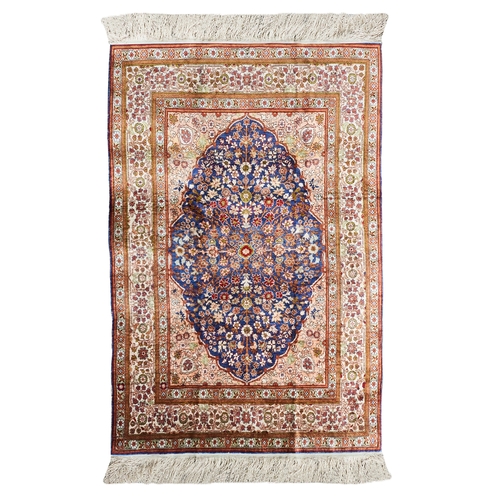 363 - TurkishA fine Hereke silk rugWeft and warped in silk pileDimensions:64 in. (L) x 38 in. (W)... 