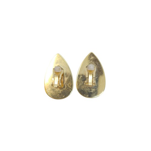 172 - LaliqueFranceCirca 1990A pair of Heliconia clear crystal and gilt metal clip earringsWeight: Approx.... 