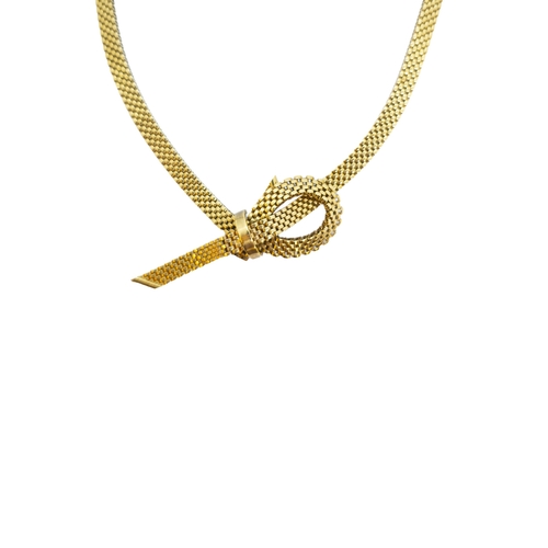 176 - British1972A 9 carat gold flexible brick link necklaceWith tied bow centreWeight: Approx. 41.52 gram... 