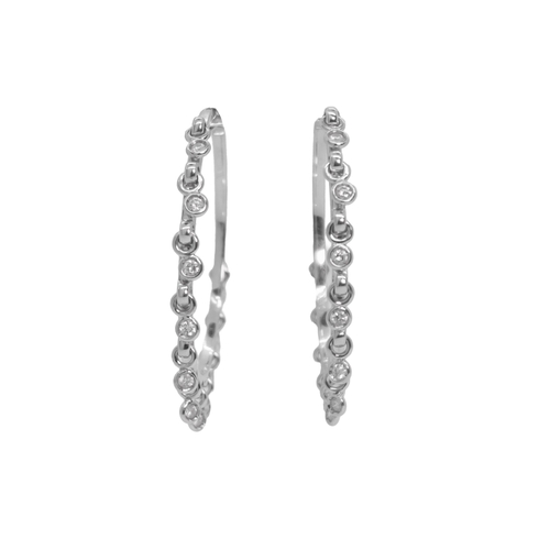 177 - Dior, ParisCirca 2000A pair of platinum and diamond hoop earringsThe large platinum hoops each appli... 