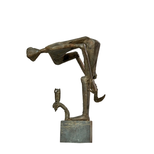 506 - Alexander Haitov (b. 1954), BulgarianA metal sculpture of a farmer and scythe looking over an owl an... 