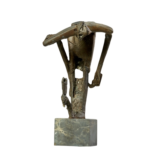 506 - Alexander Haitov (b. 1954), BulgarianA metal sculpture of a farmer and scythe looking over an owl an... 