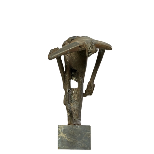 506 - Alexander Haitov (b. 1954), BulgarianA metal sculpture of a farmer and scythe looking over an owl an... 