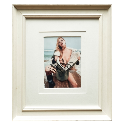 596 - BritishContemporaryA group of four signed photographs of Kate Moss.Photographed by Nick Harvey, Pete... 