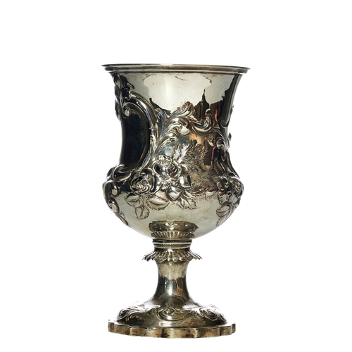 624 - BritishLondon, 1858A silver vaseDecorated overall with Rococo flower head and thistle motifsWeight: ... 