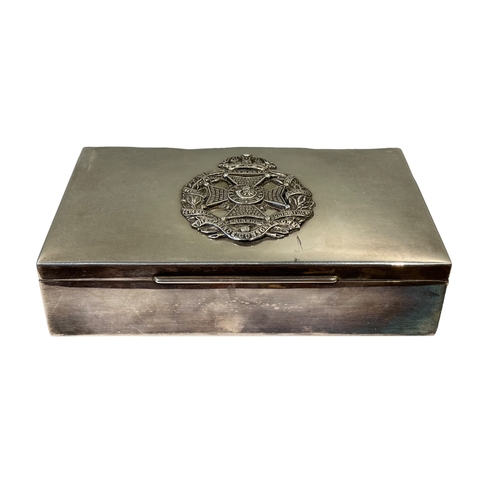 648 - ContinentalCirca 1935A silver cigarette boxWith Rifle Brigade insigniaDimensions:2 in. (H) x 8 in. (... 