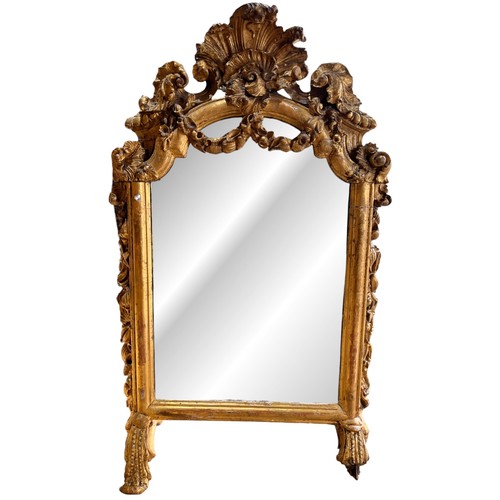 341A - British18th centuryA carved and gilded dresser mirrorDimensions:36 in. (H) x 23 in. (W) x 16 in. (D)... 