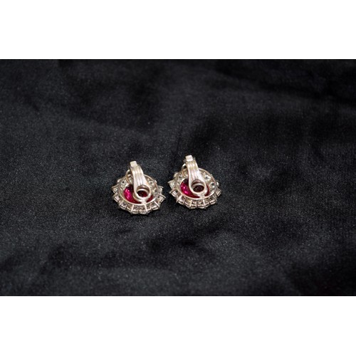 140 - BritishCirca 1990An impressive pair of pink tourmaline and brilliant cut diamond cluster earringsThe... 