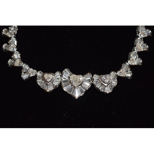 142 - BritishCirca 2000An attractive diamond necklaceComposed of heart-shaped diamond and calibré baguette... 