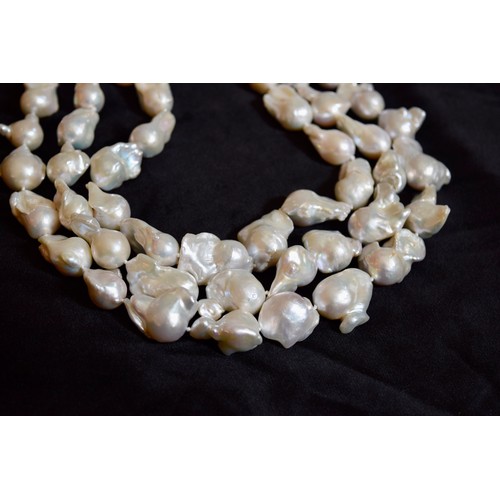 174 - ContinentalContemporaryAn impressive three-row Baroque pearl festooned necklaceWith micro-set diamon... 