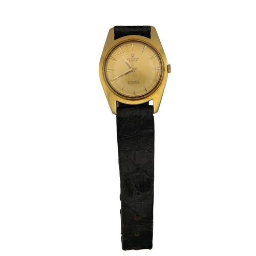 101 - 1960sA Universal Genève 18 carat gold slim line automatic wristwatchThe gold dial with a seco... 