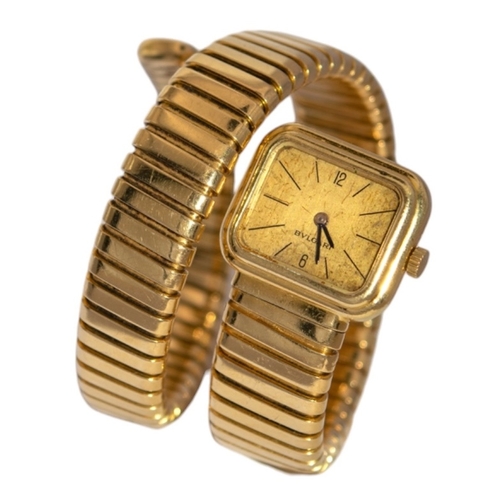 104 - BvlgariCirca 1970An 18 carat yellow gold 'serpenti tubogas' lady's wristwatchThe double-coil flexibl... 