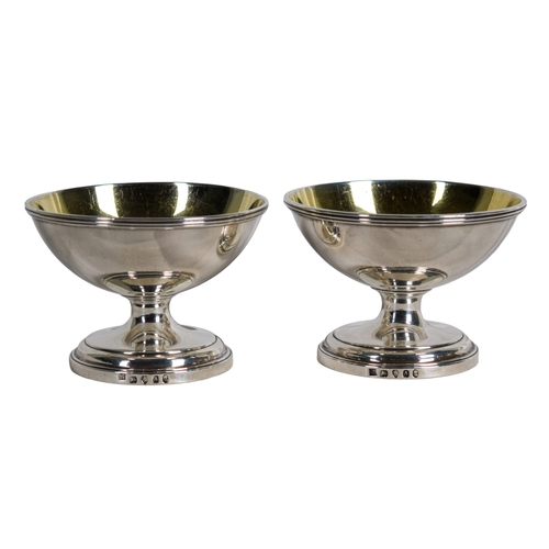 137 - Georgian, late 18th century A pair of silver gilt dishes, with maker's mark 'IWRG'203.3 grams t... 