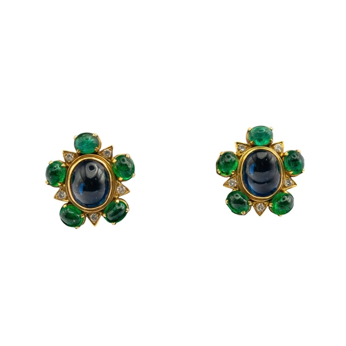 14 - EuropeanCirca 1980A pair of cabochon sapphire, emerald and brilliant cut diamond star cluster earrin... 