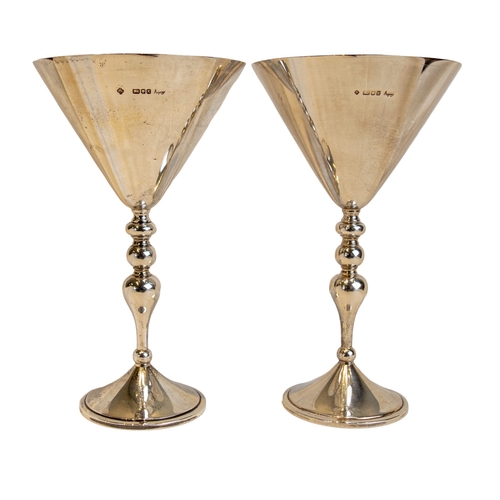 141 - BritishAsprey London, 1980sA pair of silver and silver gilt martini goblets of conical shape, each w... 